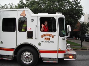 One of the "perks" of organizing the parade is that she gets to ride in the truck.  I wont say I'm not a little jealous...