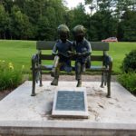 Children on Bench Statue